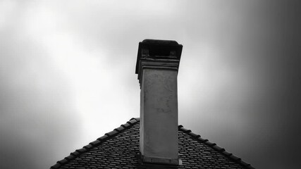 Aufkleber - A black and white photograph of a chimney, great for use in architectural or urban-themed designs