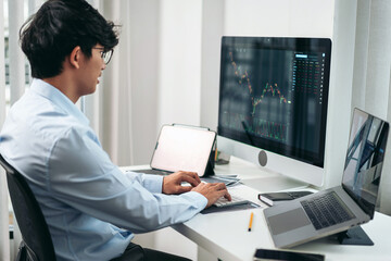 Poster - Businessman investor working with computer, tablet and analyzing graph stock market trading planning with chart data financial investment planning