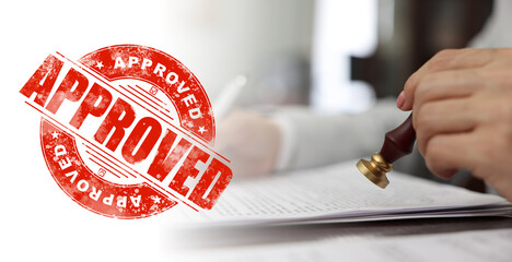 Fototapete - Woman stamping document at table and red stamp Approved, banner design