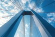 © zong - Low angle view of a towering modern suspension bridge structure set against a bright blue sky with scattered clouds, featuring taut cables creating dynamic lines