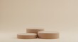 © Muaz - Three beige cylindrical podiums for product display in a minimalist studio setting