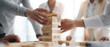 © OHMAl2T - Team building activity jenga game in office space collaborative fun