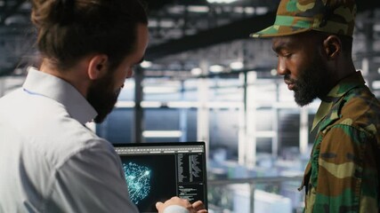 Poster - military server room it professionals using ai llm tech on laptop to review network performance. arm