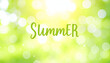 © Nelton Gomes - Summer lettering over green blurred background with bokeh effect