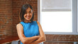 © Monkey Business - Portrait Of Businesswoman In Office Standing By Window