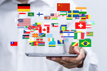 Poster - International connectivity, global business, worldwide network.  Flags on a tablet.