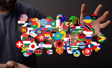 Fototapete - Diverse flags representing global unity and connection. Ideal for international business, travel, or cultural concepts.