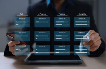 business developer using kanban board on laptop, emphasizing agile project management for rapid soft
