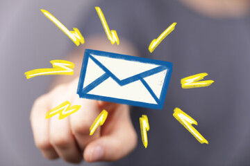 Fototapete - Close-up of hand interacting with a digital email icon, signifying new message or notification.