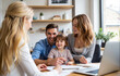 © Celt Studio - parents and child discussing agreement signing papers with consultant smiling family financial support life planning mortgage contract advice education trust indoors