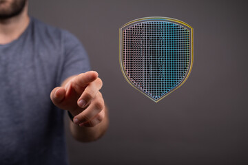 Poster - Hand reaching for a digital shield, symbolizing online security and data protection.