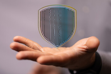 Poster - Secure your data with robust cybersecurity.  Image shows a digital shield, symbolizing protection.