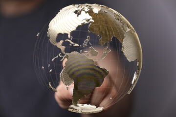 Leinwandbilder - High-quality stock photo of a hand interacting with a 3D model of the Earth, symbolizing global connectivity and networking.