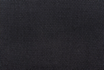 Texture of dense black fabric for tailoring. Canvas. Textile. Textile