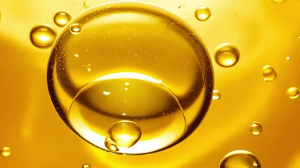 Poster - Vivid Drop of Liquid Falling Above Golden Fluid with Bubbles and Smooth Surface Reflection