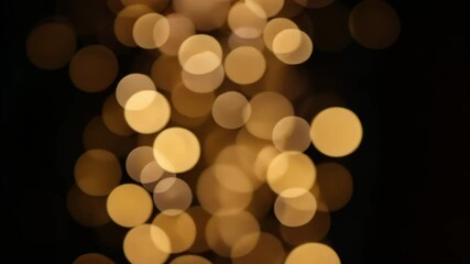 Poster - Shimmering Golden Bokeh Background with Star Shapes and Vivid Light Effects