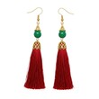 © PNG Stock - Pair of tassel earrings isolated on white background