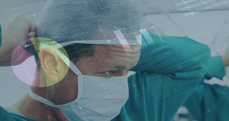 Poster - Image of data processing over caucasian male surgon wearing face mask