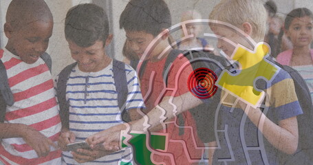 Poster - Jigsaw puzzle and human head icon against diverse group of boys using smartphone at school