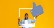 © Prostock-studio - A joyful individual expresses excitement by giving a thumbs up. They are positioned inside a social media-style frame against a vibrant yellow background, embodying positivity and engagement.
