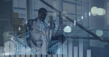 Poster - Image of financial graphs over caucasian businessman using laptop in office