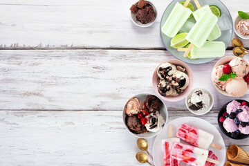 Aufkleber - Cool summer food side border. Variety of ice cream bowls, popsicles and frozen treats. Top view on a white wood background. Copy space.