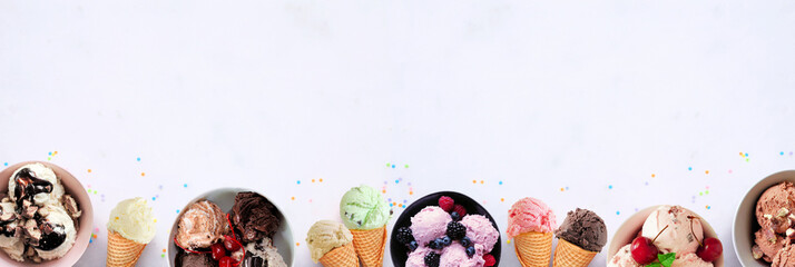 Aufkleber - Summer ice cream bottom border. Bowls and cones of colorful assorted flavors. Top view on a white marble banner background. Copy space.