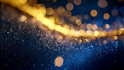 Wall Mural - abstract glittering light bokeh background with golden and blue blurred sparkling circle shapes