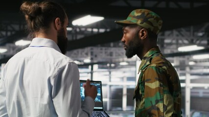 Poster - Army technicians in command center server room using artificial intelligence to detect cyber threats. Military data center experts use AI detection software to secure defense systems, camera B