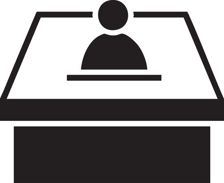 person interacts with a digital screen on a desk.