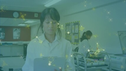 Poster - Researcher reviewing tablet data with molecular overlay pulsing as colleague loading lab centrifuge