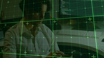 Poster - Software engineer tapping smartphone screen then glancing at monitor before typing backend code