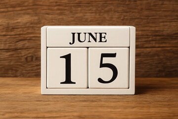 Poster - Calendar Block Displaying June 15th on Wooden Surface, Indicating a Specific Date or Important Event