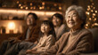 © jiawei - A group of people, including an elderly woman, are sitting on a couch