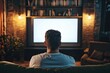 © Beras - Premium Quality Picture of Man in Home Theatre Watching Widescreen Smart Tv Showing News Broadcast