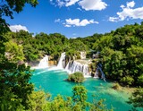 Flowing water cascades beautifully through the green forest, a fresh river landscape of Plitvice National Park, Croatia