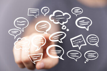 Poster - Stock photo of hand interacting with digital chat bubbles, ideal for communication, social media, and teamwork concepts.