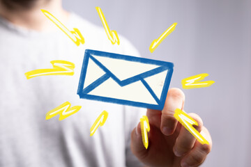 Leinwandbilder - Hand holding a digital email icon, signifying fast email delivery and notifications.