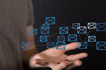 Poster - Hand holding interconnected email icons,digital communication, network, global connection.