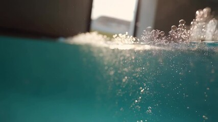 Poster - Underwater view of water splashing with sunlight creating bokeh effect.