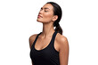 © The Stock Guy - Peaceful woman in a black tank top with eyes closed enjoying a deep breath, isolated on transparent background