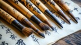 Traditional calligraphy brushes on aged paper