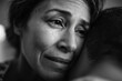 © ArtFocus Studio - A poignant monochrome portrait capturing the raw emotion of sadness and solace. A woman's tears are gently embraced, symbolizing comfort and shared grief.