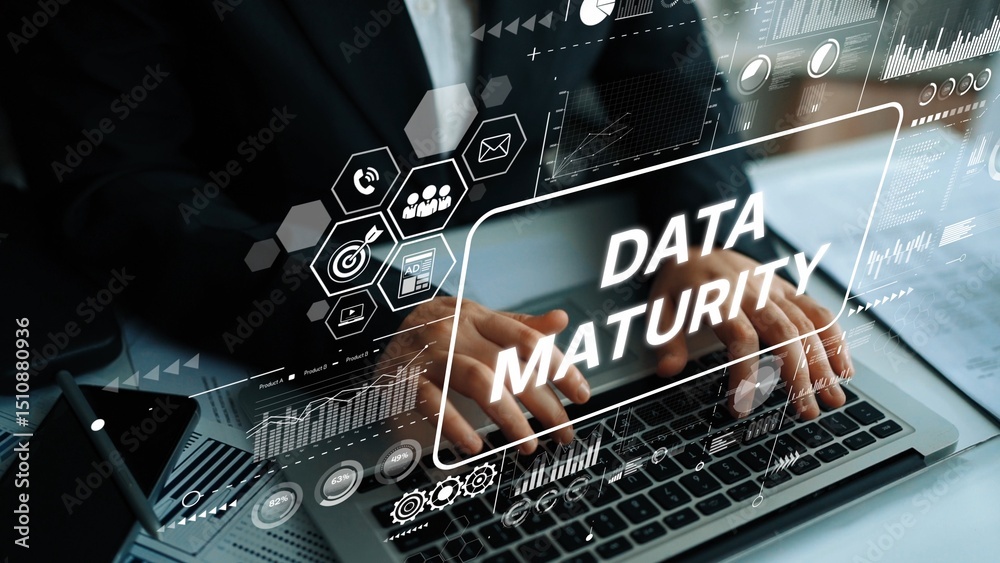 Business Professional Analyzing Data Maturity Metrics with Digital ...