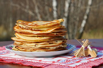 Poster - Stack of golden brown pancakes on white plate.