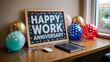 © MdAyub - Festive Office Desk with 'Happy Work Anniversary' Chalkboard, Balloons & Confetti