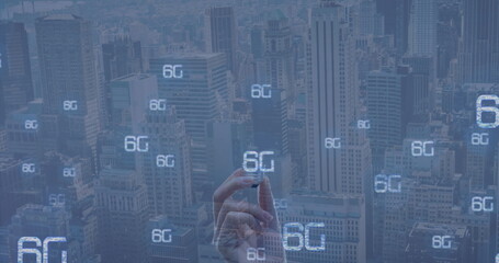 Poster - Image of 6g and hand of caucasian woman with bulb over cityscape