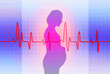 © Westend61 - Silhouette of a pregnant woman with heartbeat graph in a medical concept illustration