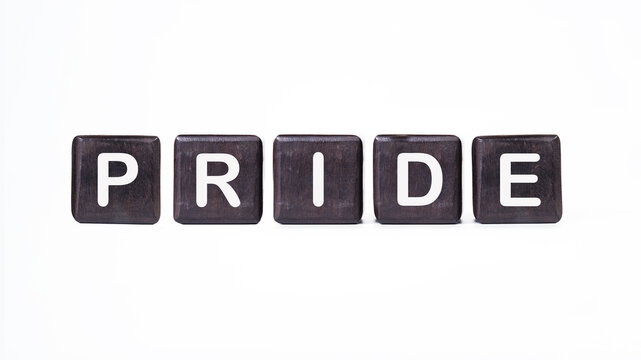 PRIDE word written on four blocks on a light background