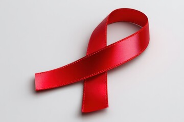 Poster - Red Kidney Awareness Ribbon Displayed Against a Soft White Background Highlighting the Importance of Health and Advocacy